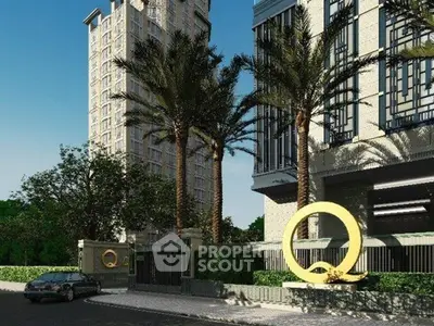 Luxurious modern building exterior with palm trees and sleek design