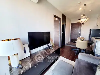 Modern living room with sleek furniture and stylish decor in a contemporary apartment.