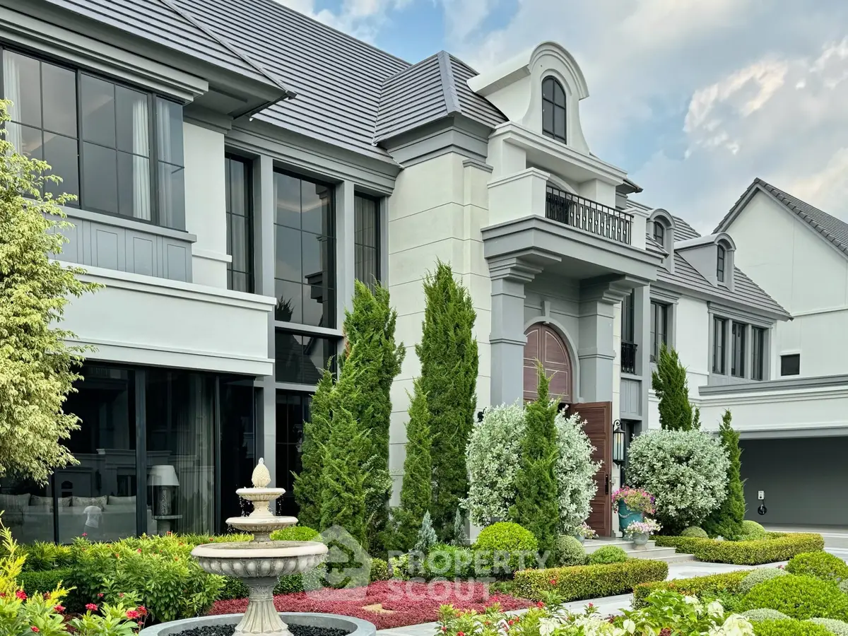 Luxurious modern mansion with elegant facade and lush landscaping