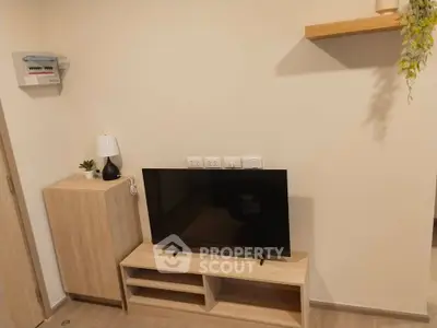 Modern living room with sleek TV setup and minimalist decor