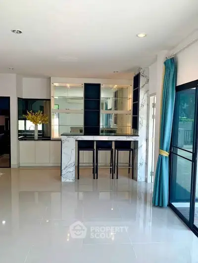 Spacious modern living room with elegant marble bar and large windows