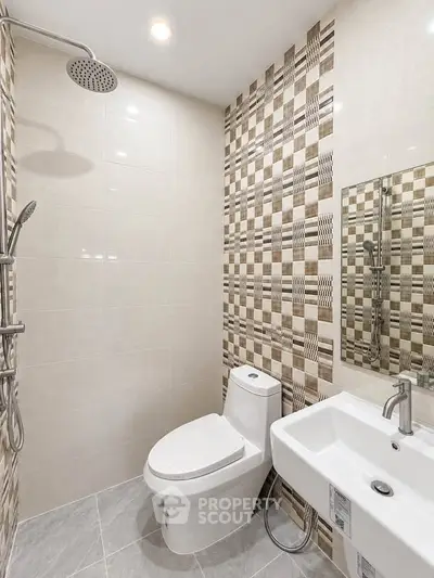 Modern bathroom with stylish tile design and contemporary fixtures