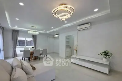 Spacious modern living room with elegant lighting and minimalist decor