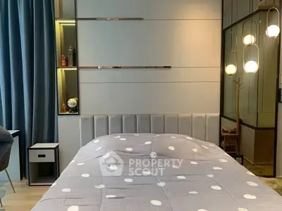 Modern bedroom with stylish lighting and cozy decor