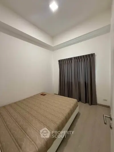 Cozy bedroom with modern decor and natural light