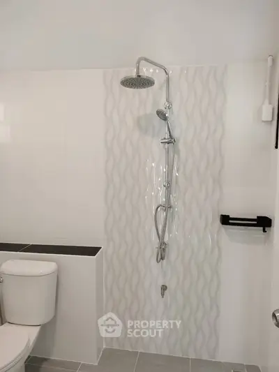 Modern bathroom with stylish shower and sleek tile design