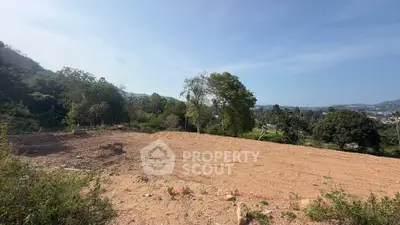Expansive plot of land with scenic views, perfect for building your dream home in a serene environment.