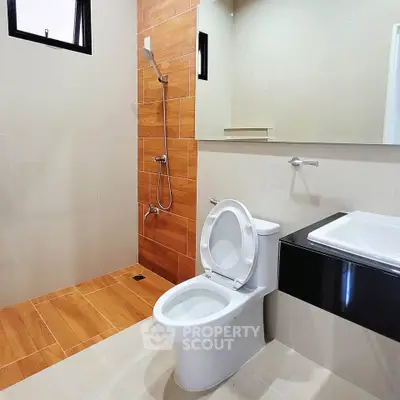 Modern bathroom with sleek fixtures and stylish tile design