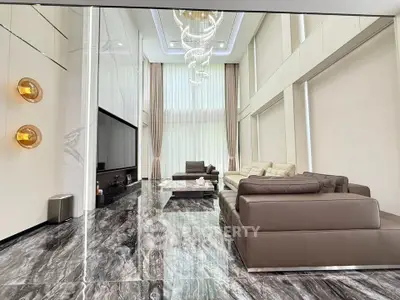 Luxurious modern living room with high ceilings and elegant marble flooring