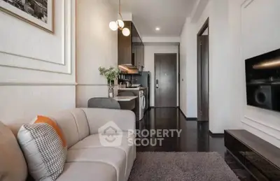 Modern living room with sleek kitchen and cozy sofa in stylish apartment