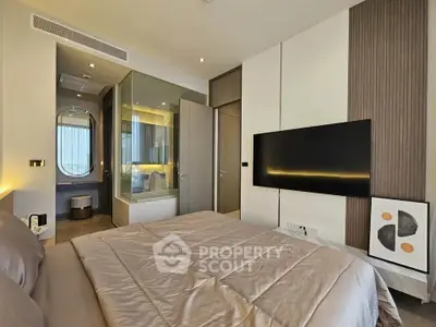 Luxurious modern bedroom with ensuite bathroom and sleek decor