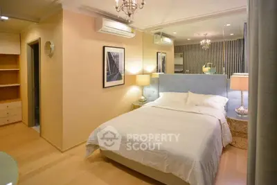 Luxurious bedroom with elegant decor and ambient lighting