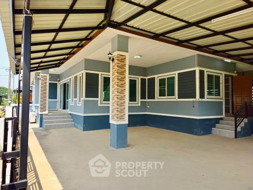 Modern single-story home with covered carport and stylish exterior design.