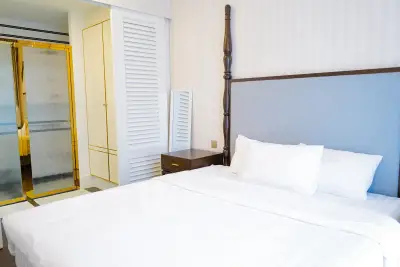 Luxurious bedroom with elegant decor and ensuite bathroom