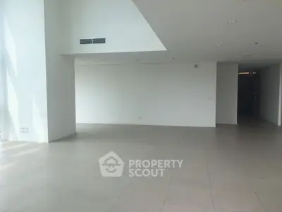 Spacious open-plan interior with modern design and abundant natural light.