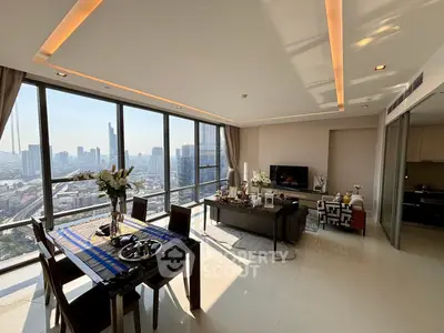 Luxurious high-rise living room with panoramic city views and elegant modern decor.