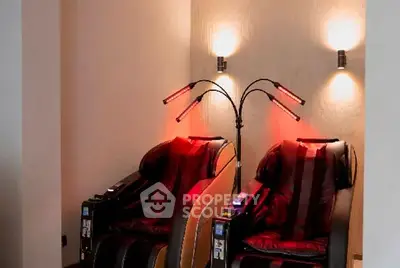Luxurious relaxation corner with modern massage chairs and ambient lighting