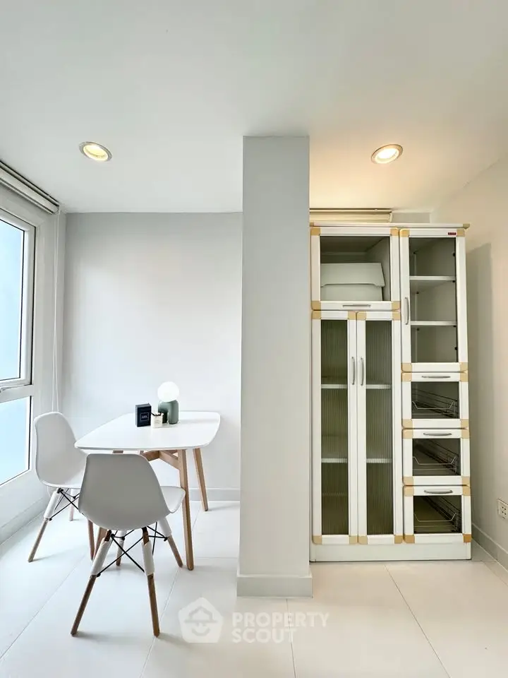 Bright study area with modern furniture and ample natural light