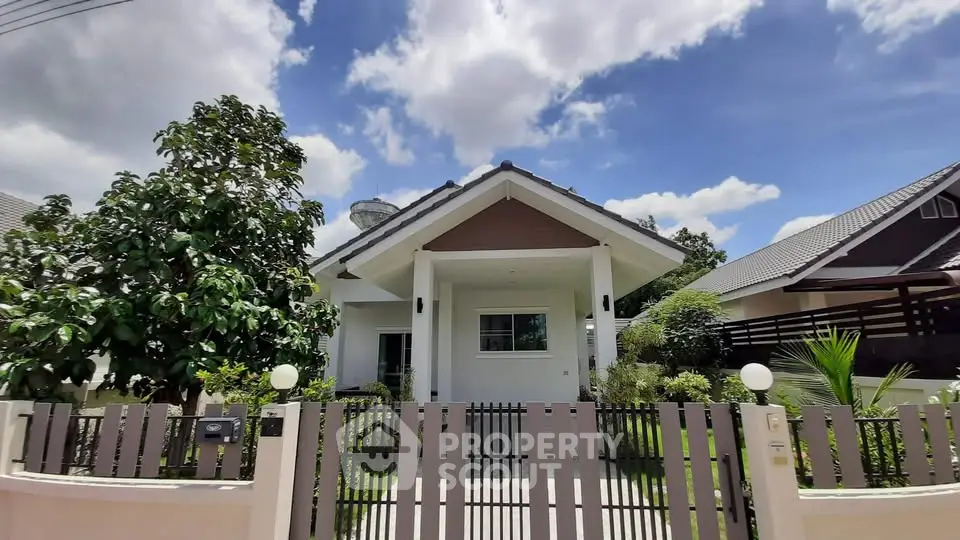 Charming single-story house with lush garden and modern design in a serene neighborhood.