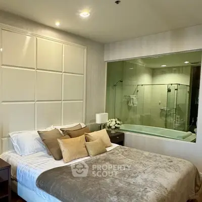 Luxurious bedroom with ensuite bathroom and elegant decor