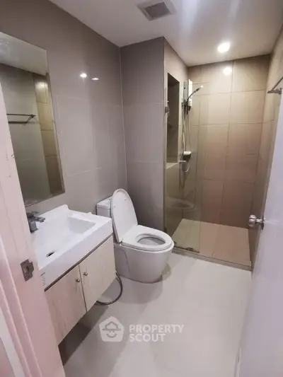 Modern bathroom with sleek shower and contemporary fixtures