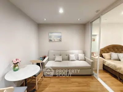 Modern living room with cozy sofa and elegant decor in a stylish apartment.