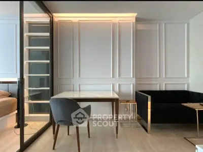 Modern interior with elegant paneling and sleek furniture in a cozy living space.