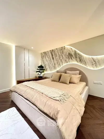 Luxurious modern bedroom with elegant lighting and stylish decor
