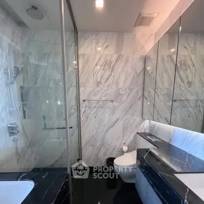 Luxurious marble bathroom with sleek fixtures and modern design