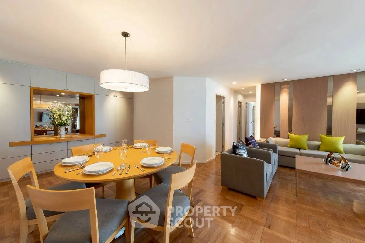 Spacious modern living room with elegant dining area and stylish decor