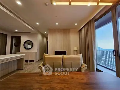 Spacious modern living room with balcony view and elegant wooden decor