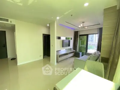 Modern living room with sleek design and city view balcony