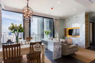 Luxurious open-plan living room with stunning city view and elegant decor