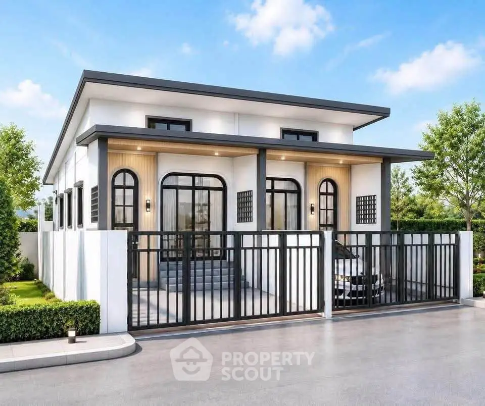 Modern single-story house with sleek design and gated entrance, perfect for contemporary living.