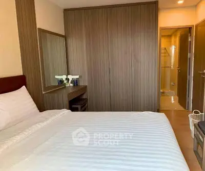 Cozy bedroom with ensuite bathroom and ample closet space