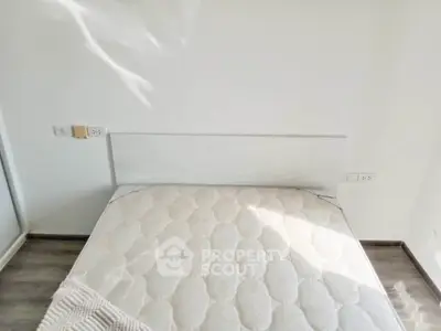 Bright and cozy bedroom with a comfortable bed and modern decor