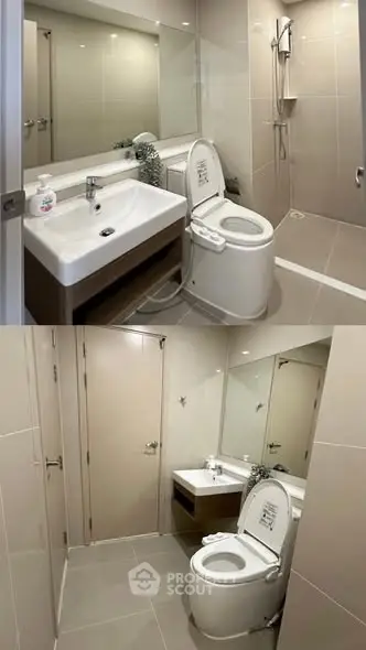 Modern bathroom with sleek fixtures and spacious shower area.