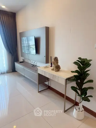 Modern living room with sleek TV setup and elegant decor