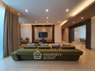 Luxurious modern living room with elegant green sofa and ambient lighting