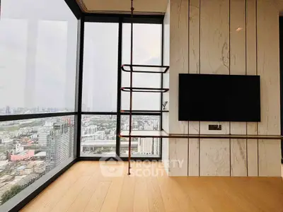 Stunning corner unit with panoramic city views and modern interior design.
