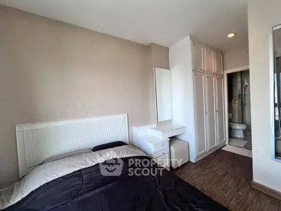 Modern bedroom with ensuite bathroom and stylish decor