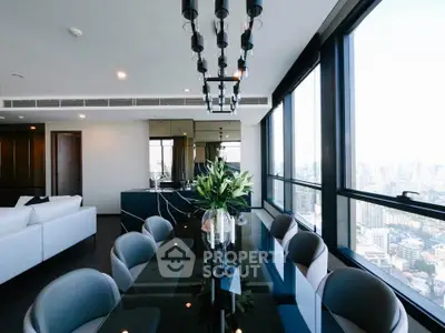Luxurious modern dining room with panoramic city views and elegant black table.