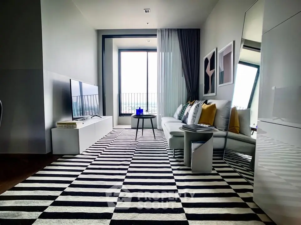 Modern living room with striped rug and large window view