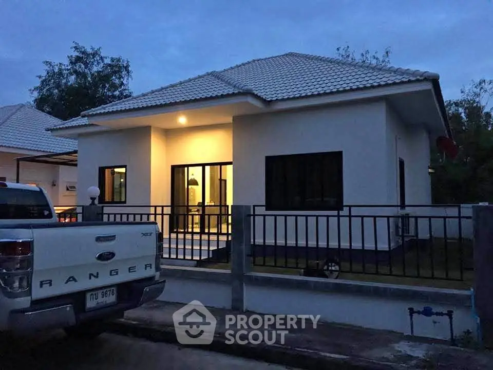 Charming single-story home with modern exterior and cozy ambiance.