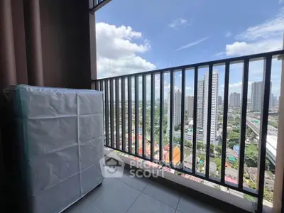 Stunning high-rise balcony with panoramic city views, perfect for urban living.