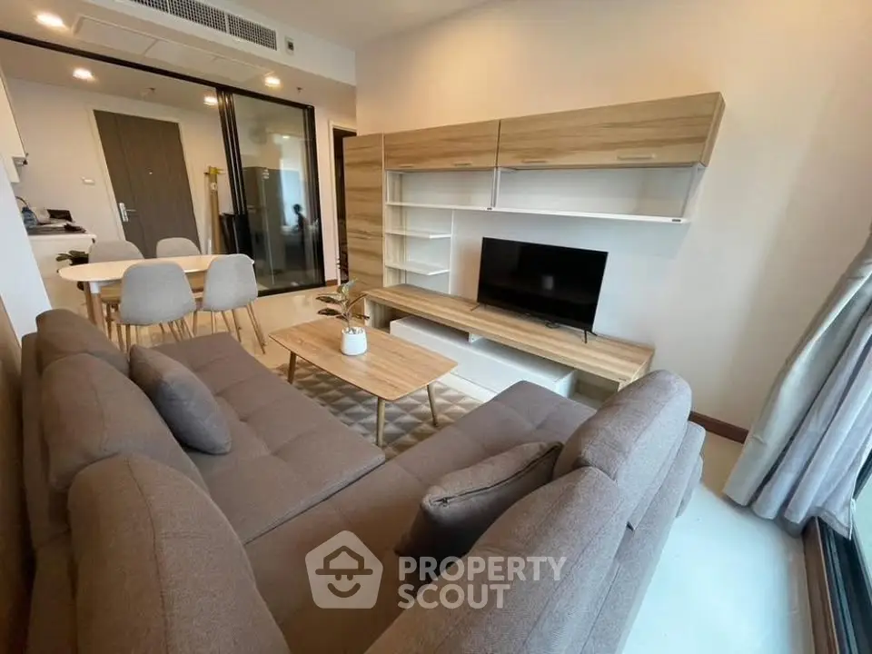 Modern living room with stylish furniture and open layout in a contemporary apartment.