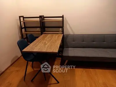 Cozy study room with modern furniture and wooden flooring