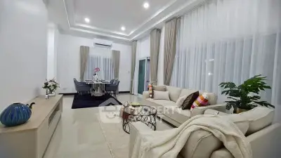 Elegant living room with modern decor and dining area, featuring cozy seating and stylish lighting.