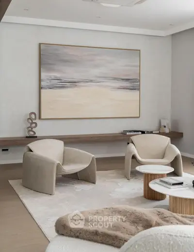 Elegant modern living room with stylish furniture and abstract art, perfect for contemporary home buyers.
