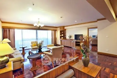 Spacious and elegant living room with wooden flooring and modern furniture